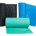 Rolls  of disposable trash bags isolated on white background