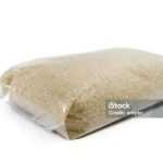 Plastic Bag of Sugar Isolated on White